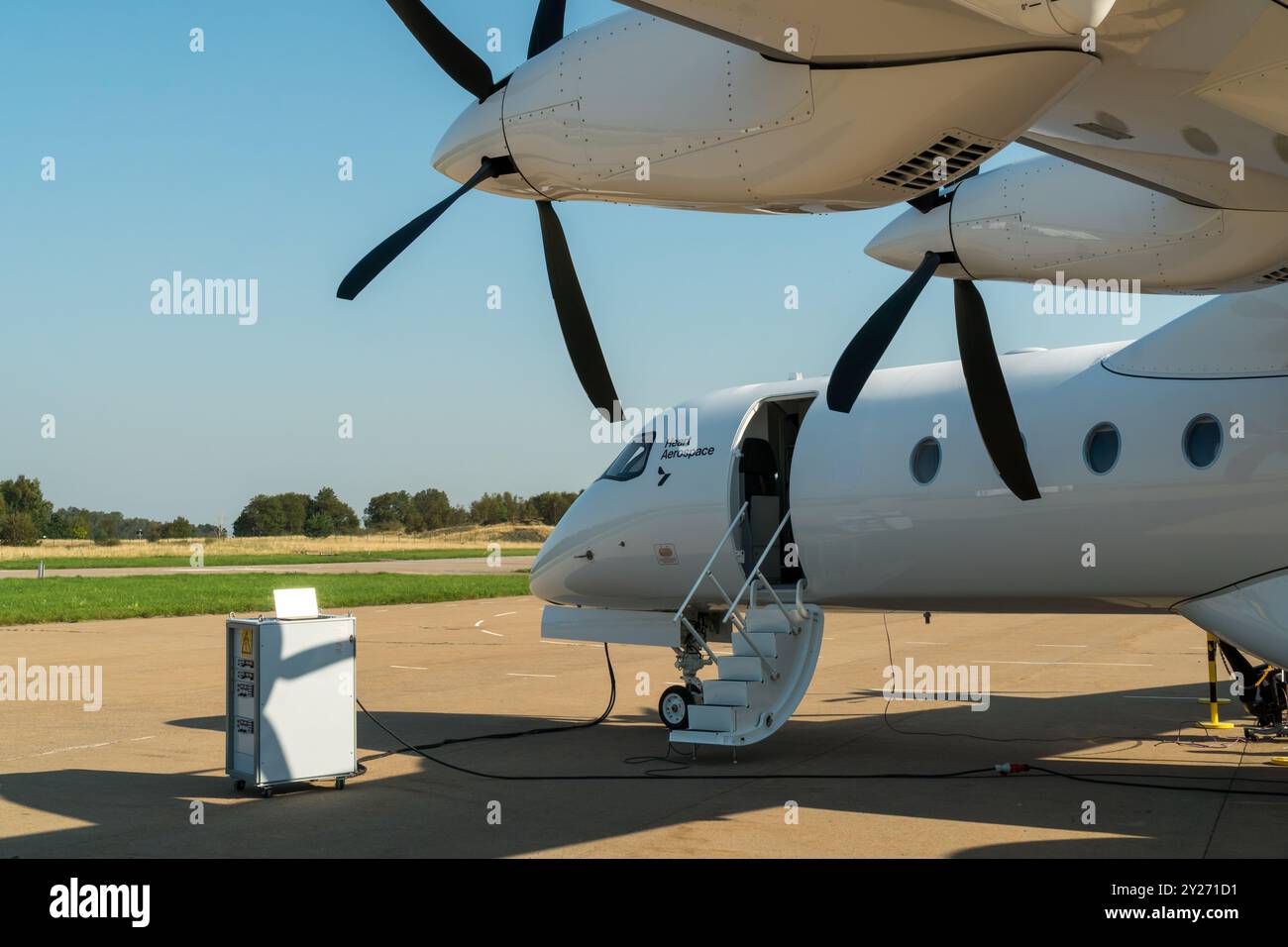 Heart Aerospace, a start up company creating a battery electric hybrid airplane. Close up of the ES-30 aircraft, with the propellers and staircase Stock Photo