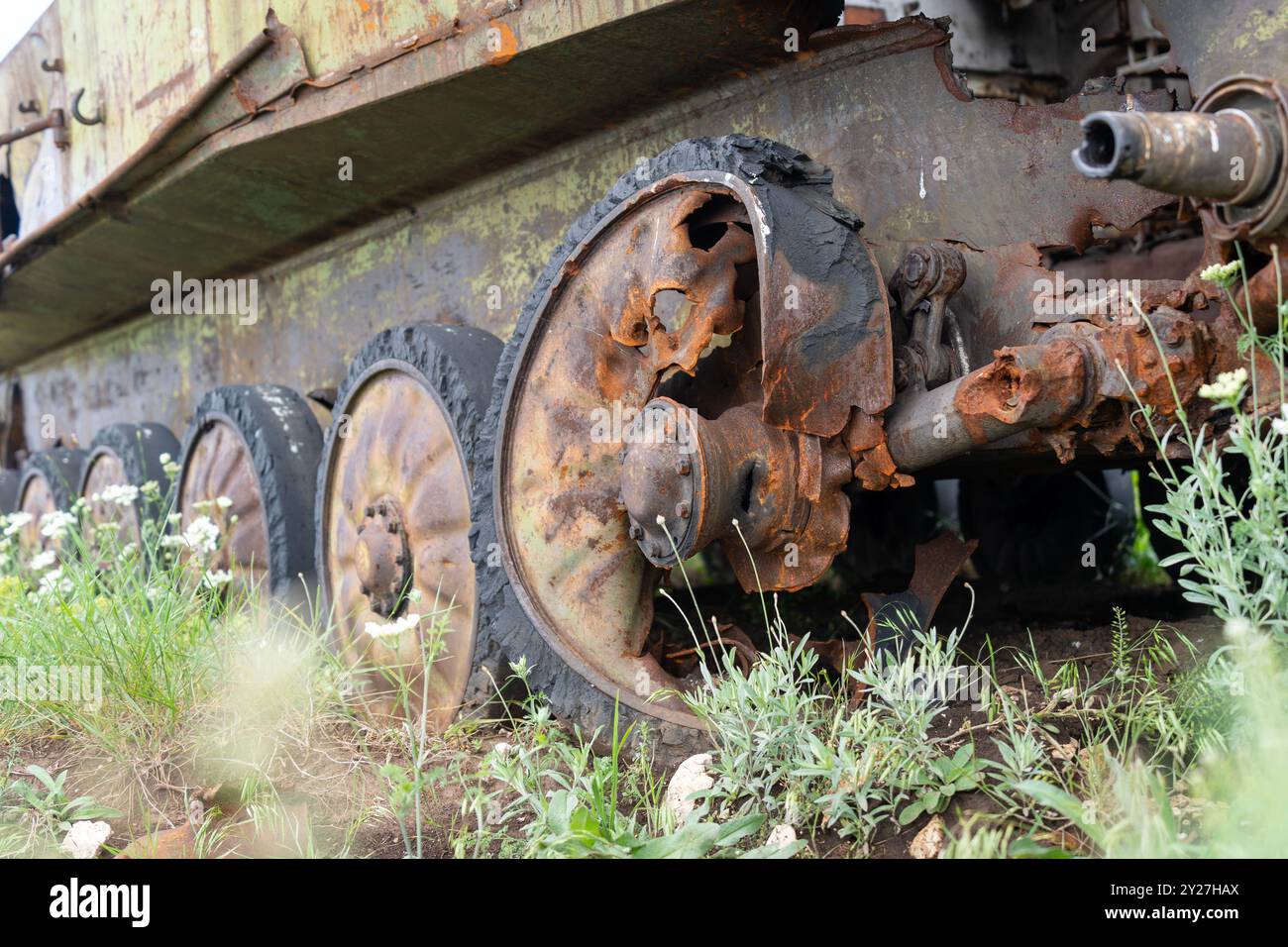 Rusty old soviet military vehicle wreck wheels in a field Stock Photo ...