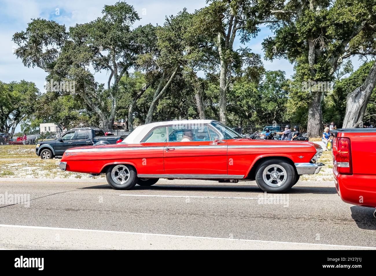 Gulfport, MS - October 07, 2023: Wide angle side view of a 1962 Chevrolet Impala Sport Coupe at a local car show. Stock Photo