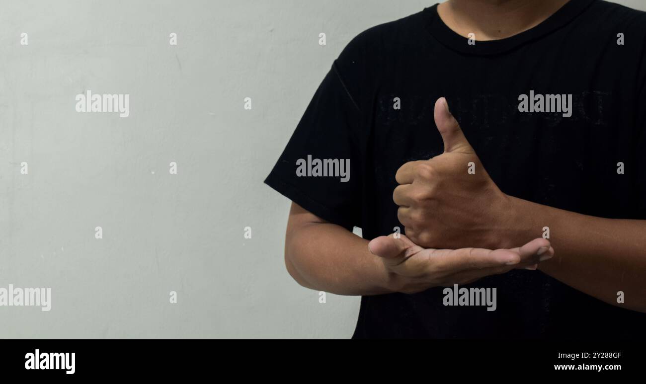 young man learning sign language Stock Photo