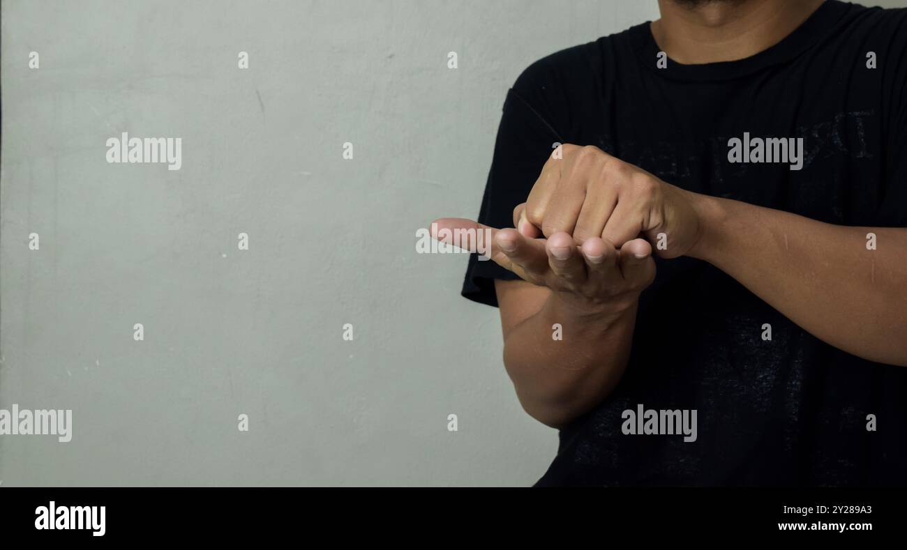 young man learning sign language Stock Photo