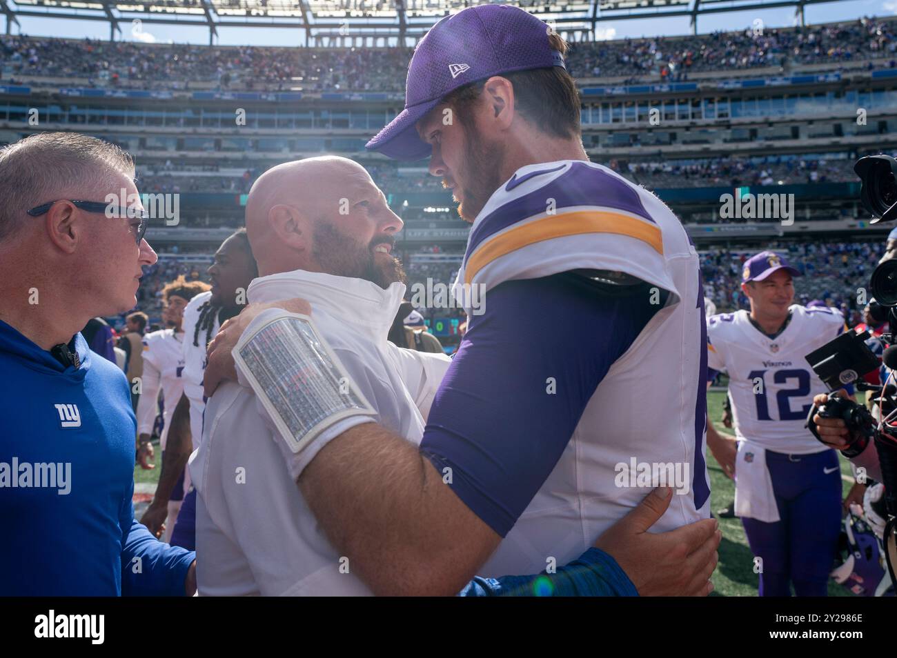 New York Giants head coach Brian Daboll talks with Minnesota Vikings quarterback Sam Darnold (14) following the NFL football game, Sunday, Sept. 8, 2024, in East Rutherford. The Vikings won 28-6. (Christopher Szagola/Cal Sport Media) (Credit Image: © Christopher Szagola/Cal Sport Media) Stock Photo