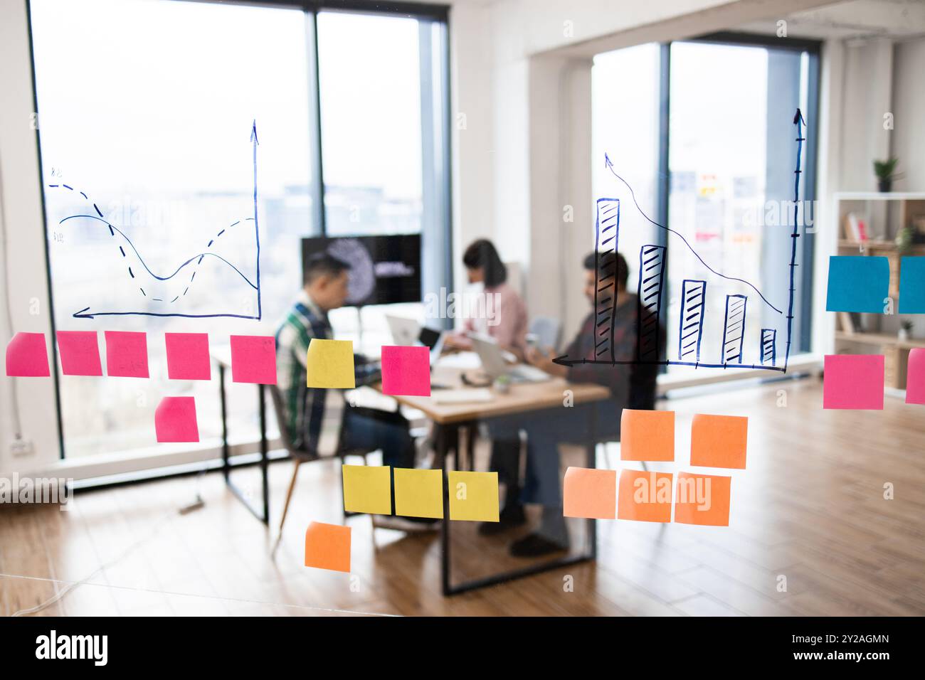 IT experts working on artificial intelligence developments in modern office Stock Photo