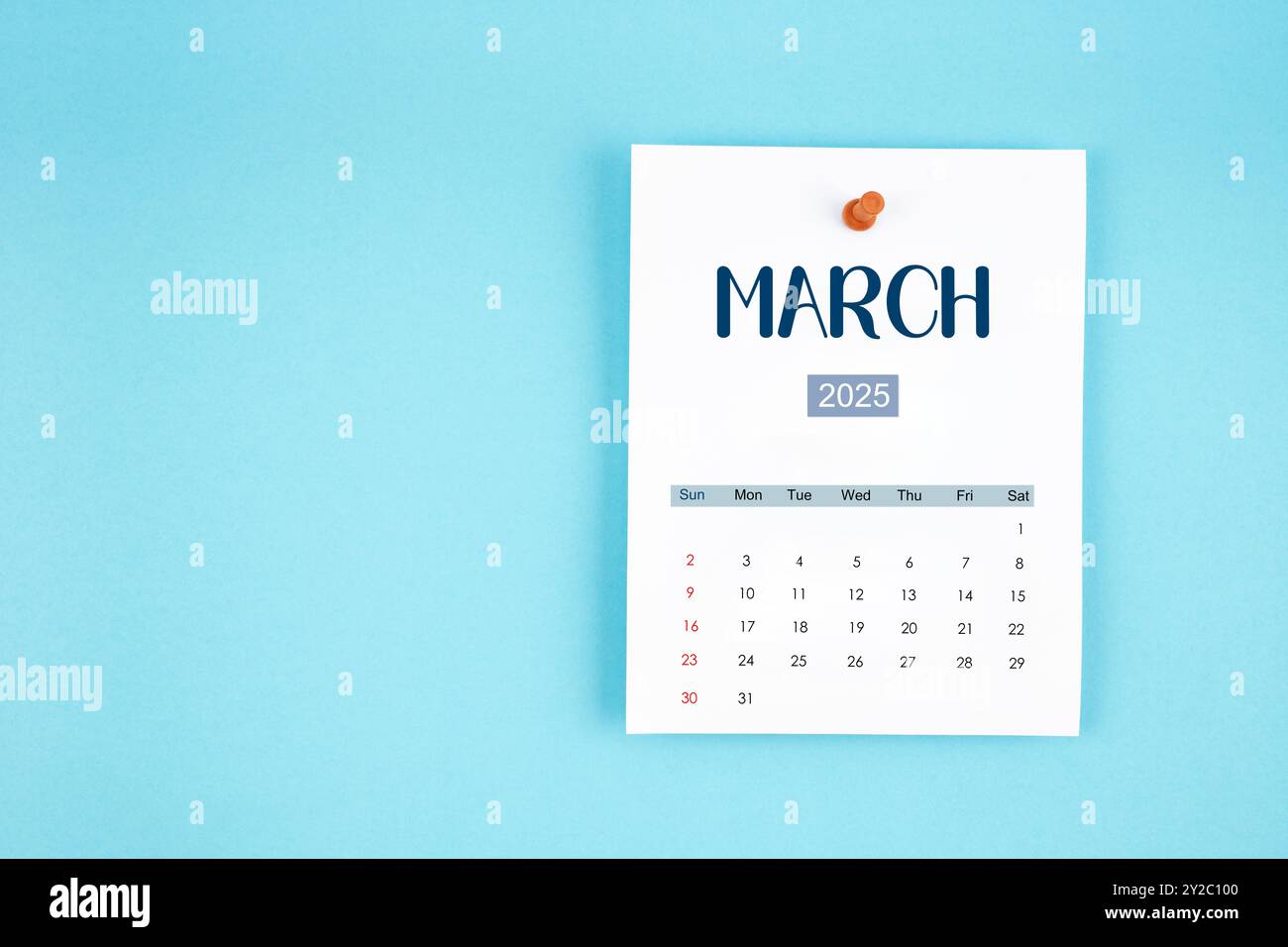 march-2025-calendar-page-with-push-pin-on-blue-color-background-stock-photo-alamy