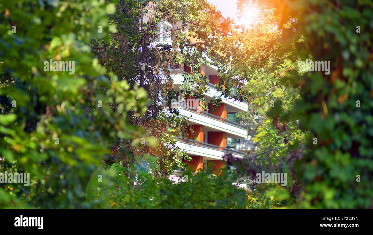 Eco apartment building saving energy and fresh air concept. European ...
