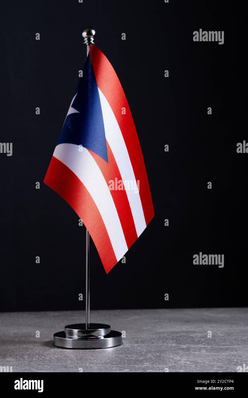 Puerto Rico Flag on Metal Flagpole Isolated on Black Background Stock ...