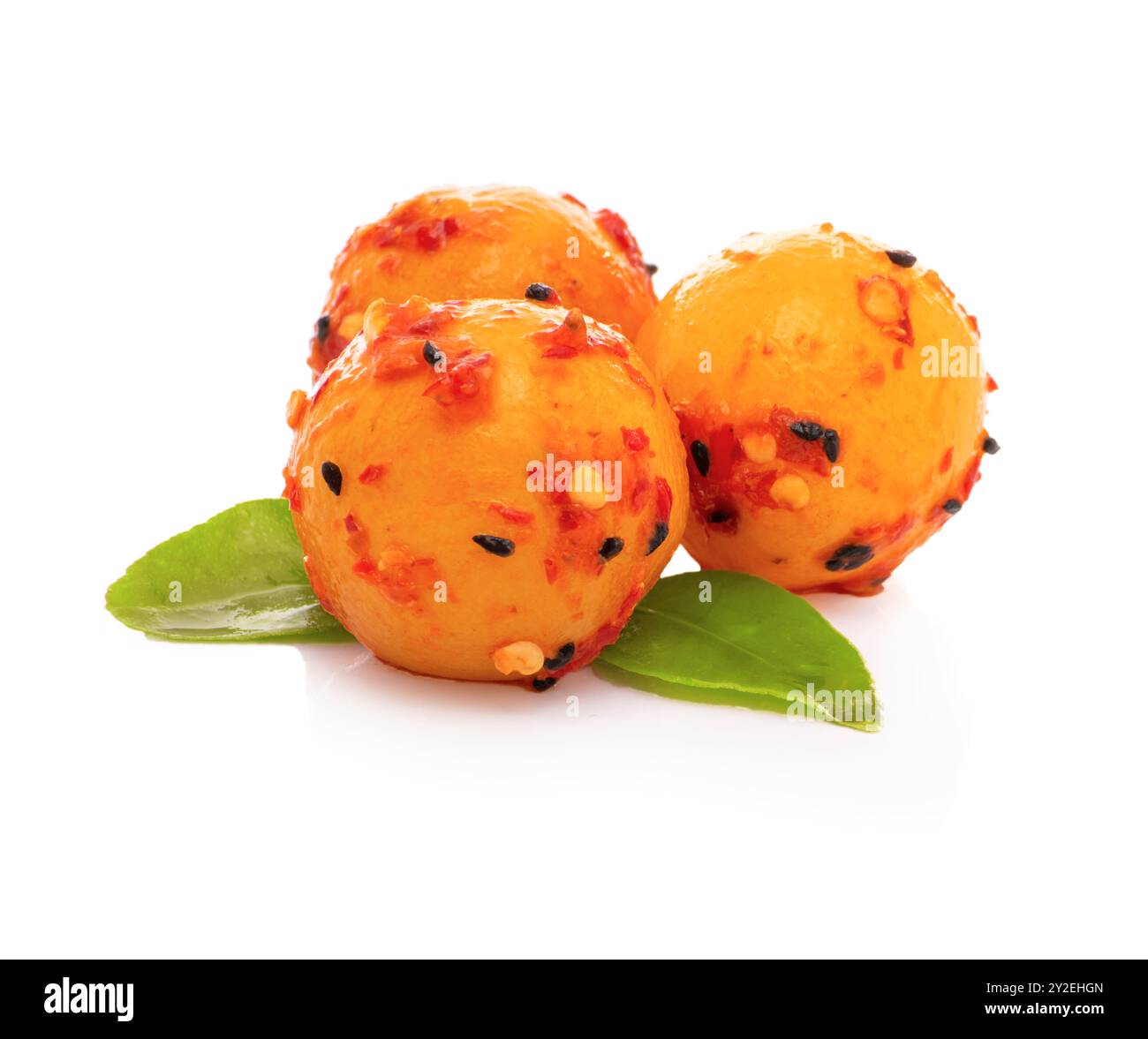 Two Spicy Pickled Lemons Isolated on White Background Stock Photo
