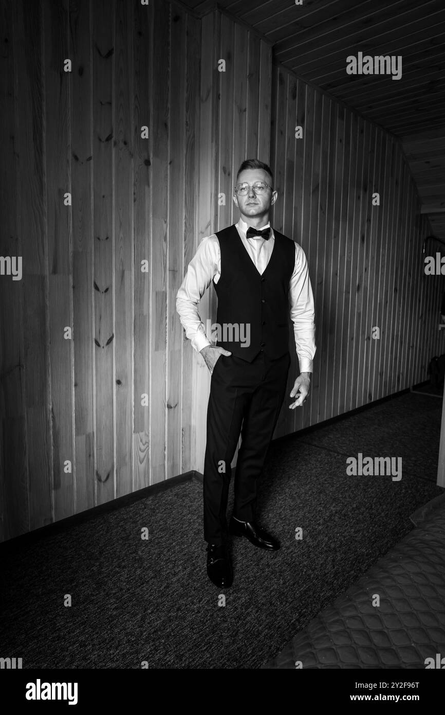Elegant Portrait of Man in Formal Attire Against Wooden Backdrop Stock ...
