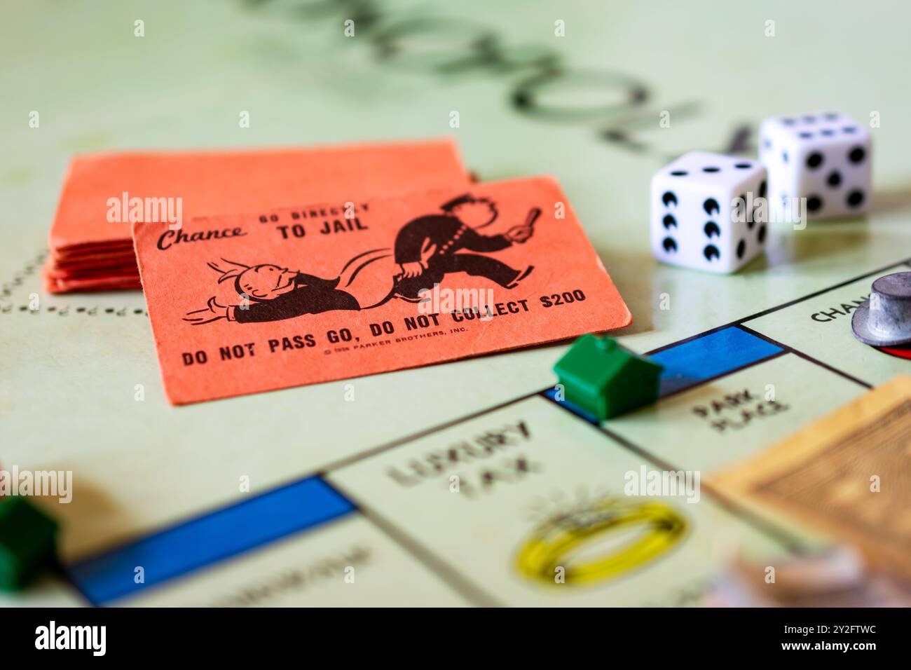 A moment in Monopoly: Go directly to jail chance card on a Monopoly ...