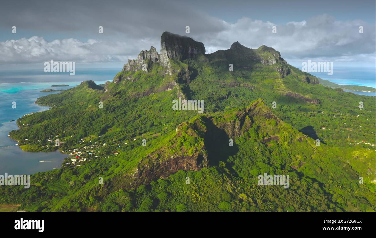 Drone capturing stunning landscape of Bora Bora green tropical island ...