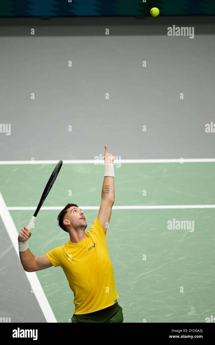 Valencia, Spain. 10th Sep, 2024. VALENCIA, SPAIN - SEPTEMBER 10: Thanasi Kokkinakis of Australia serves against Arthur Fils of France during the Davis Cup Group Stage 2024 Valencia match between Australia and France at Pabellon Fuente De San Luis on September 10, 2024 in Valencia, Spain. (Photo by Francisco Macia/Photo Players Images/Magara Press) Credit: Magara Press SL/Alamy Live News Stock Photo