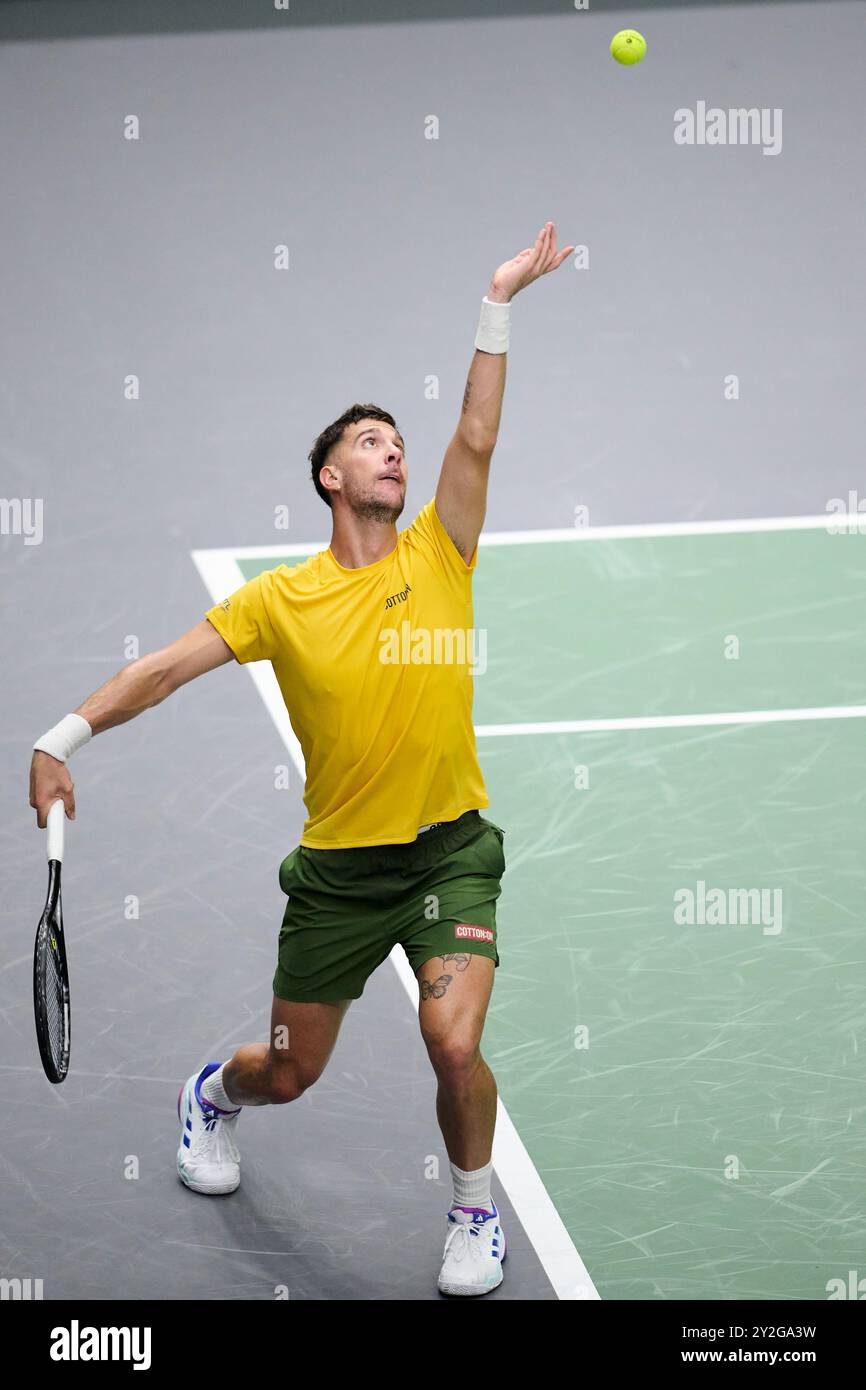 Valencia, Spain. 10th Sep, 2024. VALENCIA, SPAIN - SEPTEMBER 10: Thanasi Kokkinakis of Australia serves against Arthur Fils of France during the Davis Cup Group Stage 2024 Valencia match between Australia and France at Pabellon Fuente De San Luis on September 10, 2024 in Valencia, Spain. (Photo by Francisco Macia/Photo Players Images/Magara Press) Credit: Magara Press SL/Alamy Live News Stock Photo