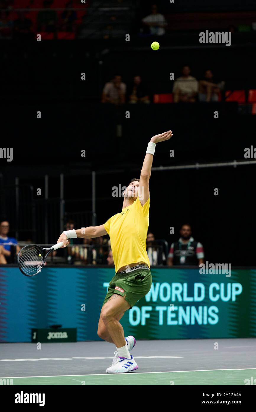 Valencia, Spain. 10th Sep, 2024. VALENCIA, SPAIN - SEPTEMBER 10: Thanasi Kokkinakis of Australia serves against Arthur Fils of France during the Davis Cup Group Stage 2024 Valencia match between Australia and France at Pabellon Fuente De San Luis on September 10, 2024 in Valencia, Spain. (Photo by Francisco Macia/Photo Players Images/Magara Press) Credit: Magara Press SL/Alamy Live News Stock Photo