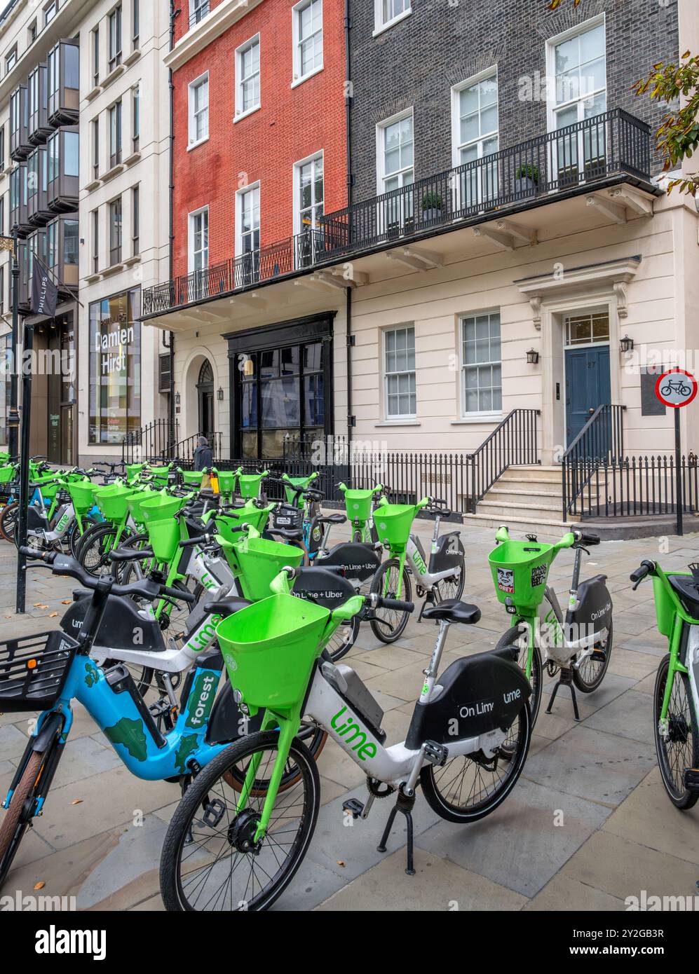 Lime electric bikes in Berkeley Square, Mayfair, London, England, UK Stock Photo