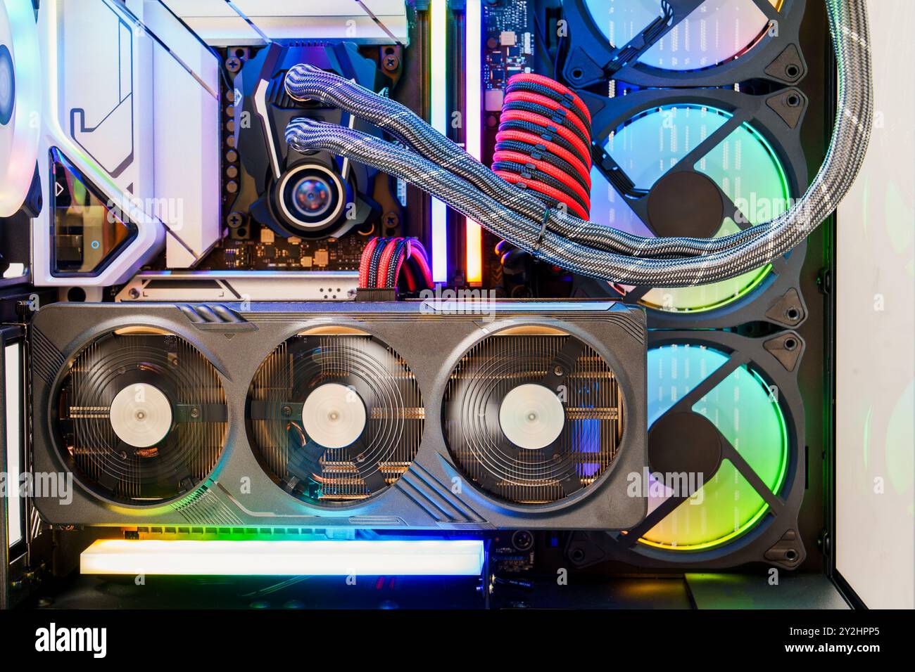 A colorful desktop computer with a transparent side panel revealing ...