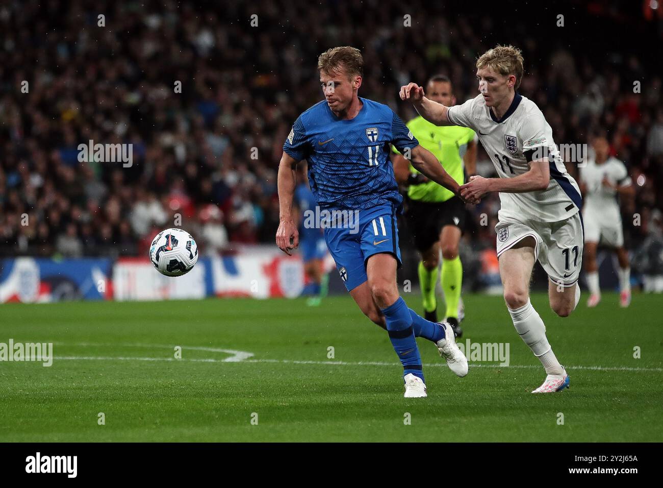 London, UK. 10th Sep, 2024. England's Anthony Gordon battles for the ball against Finland's Rasmus Schuller during the England v Finland Nations League Round 1 match at Wembley Stadium, London, England, United Kingdom on 10 September 2024 Credit: Every Second Media/Alamy Live News Stock Photo