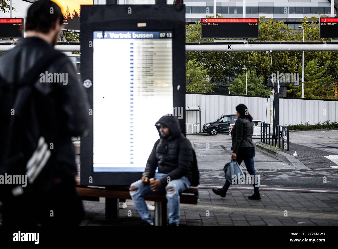 EINDHOVEN - Passengers at bus station Eindhoven Centraal during a strike by regional transport companies. Trade union FNV has organized several strikes. The goal is to urge the cabinet to come up with a regulation that would allow ov workers to quit heavy work earlier. ANP ROB ENGELAAR netherlands out - belgium out Stock Photo