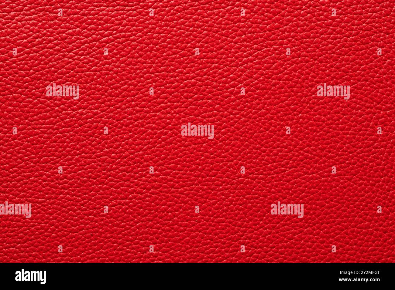 genuine leather dyed red. leather texture background Stock Photo