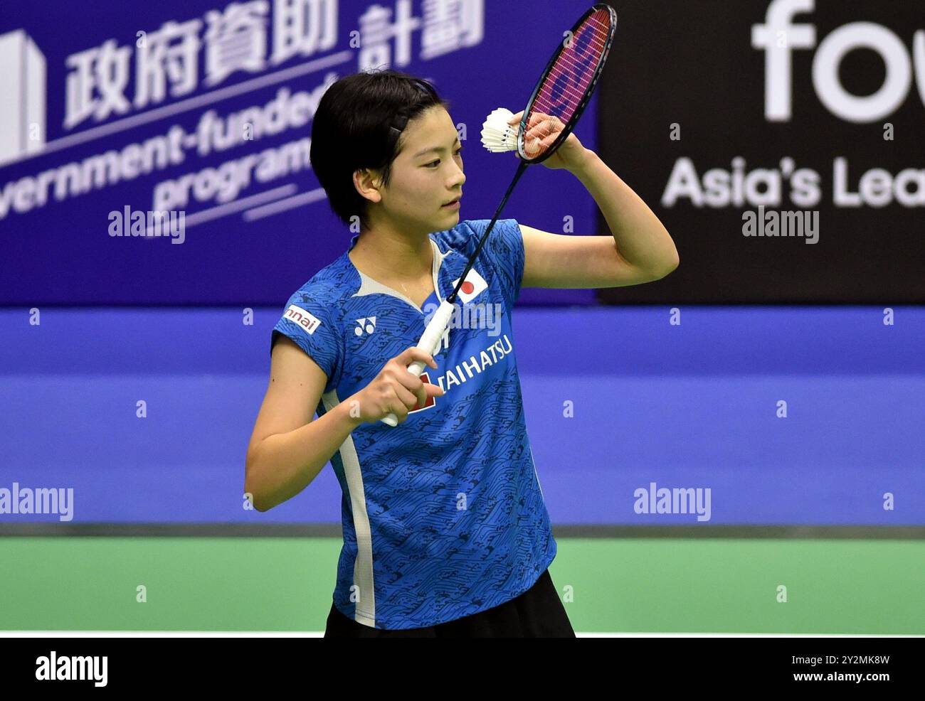 Hongkong, China. 11th Sep, 2024. Miyazaki Tomoka of Japan prepares to serve during the women's singles round of 32 match between Yu Chien Hui of Chinese Taipei and Miyazaki Tomoka of Japan at the Hong Kong Open 2024 badminton tournament in Hong Kong, China, Sept. 11, 2024. Credit: Lo Ping Fai/Xinhua/Alamy Live News Stock Photo