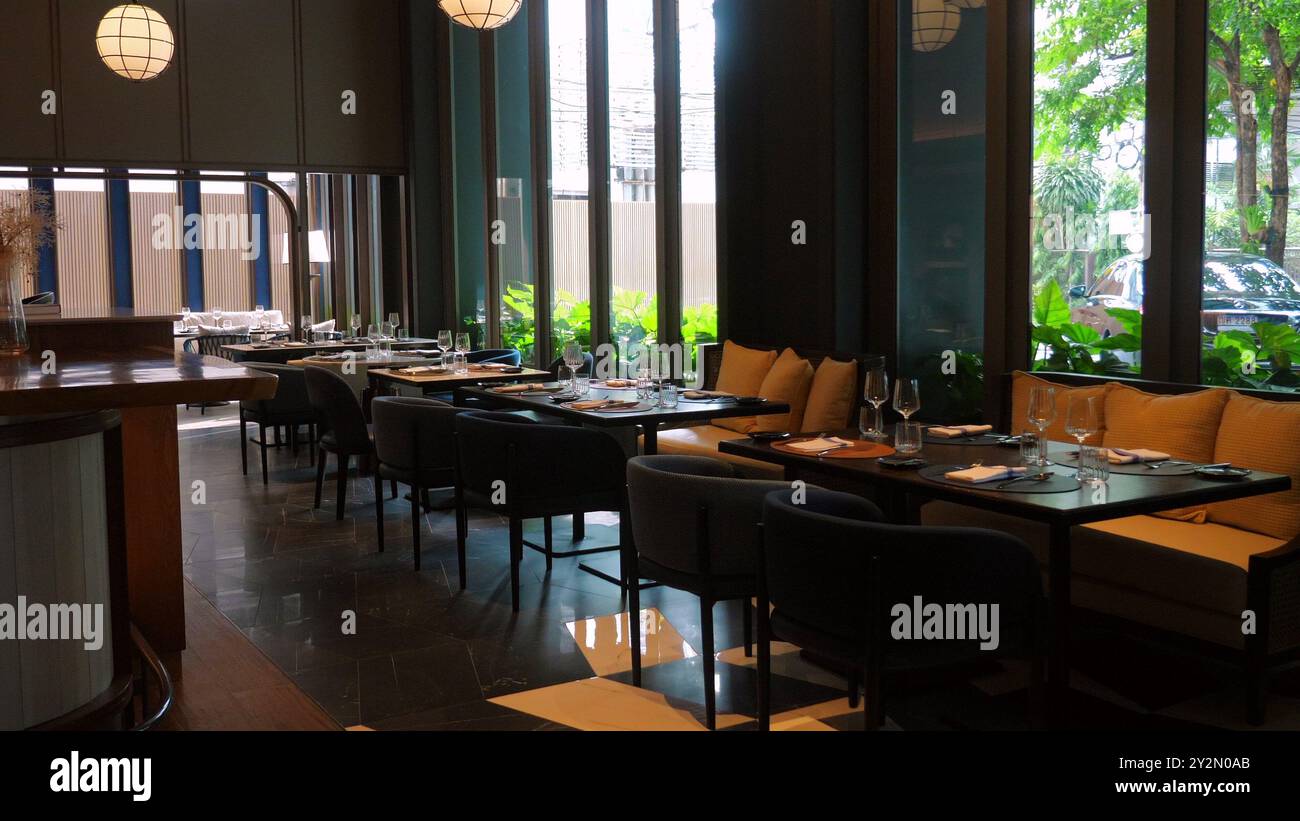 Modern upscale restaurant interior with elegant decor and large Stock ...