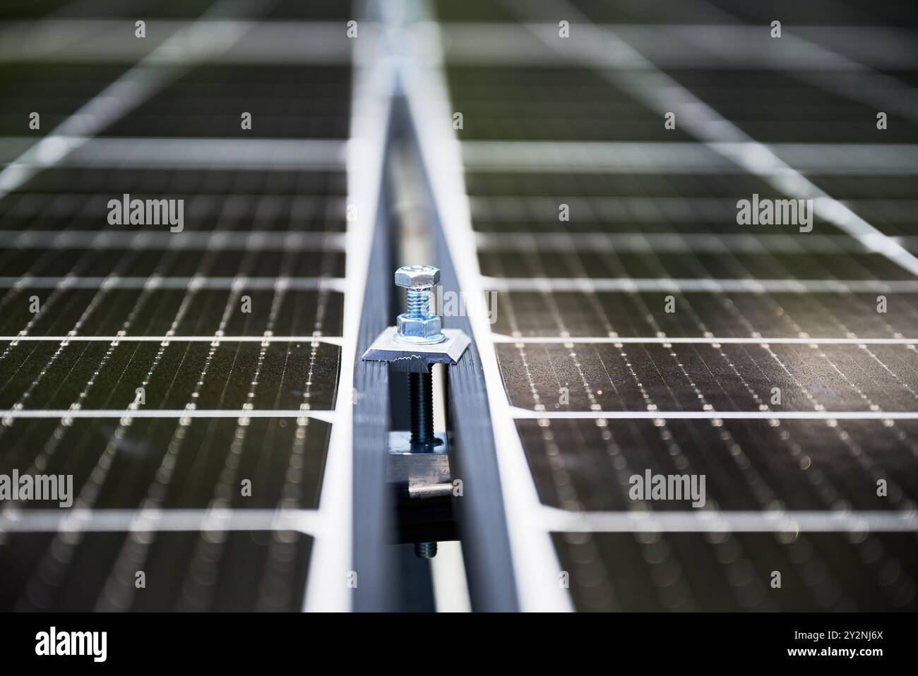 Close up of mounting hardware on solar panel, focusing on the details ...