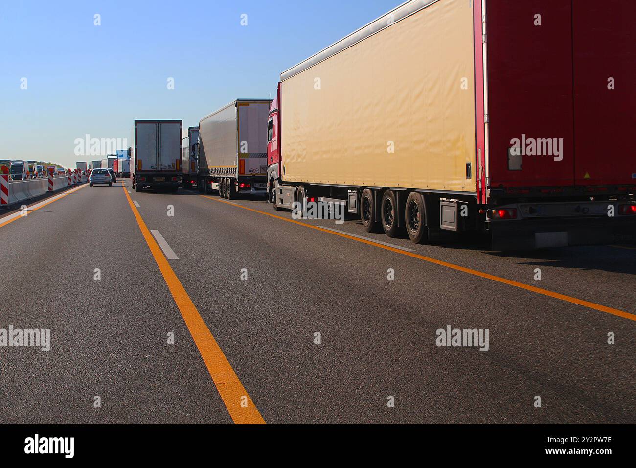 Slow-moving lorry traffic on right lane and jam on left lane due to roadworks (A6, near Pforzheim, Germany) Stock Photo