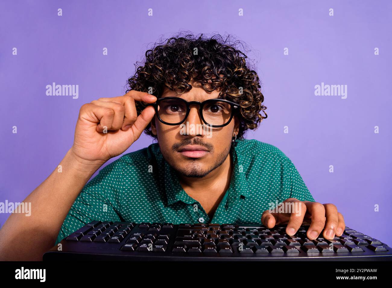 Closeup photo of focused guy system administrator working using pc ...