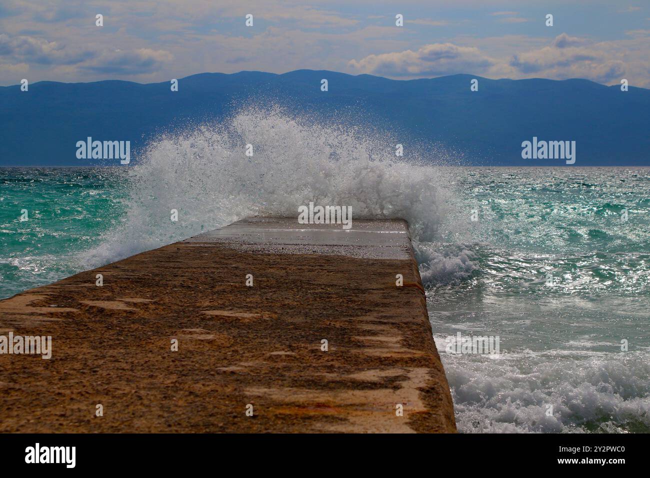 Sea water splashing over walkway hi-res stock photography and images ...