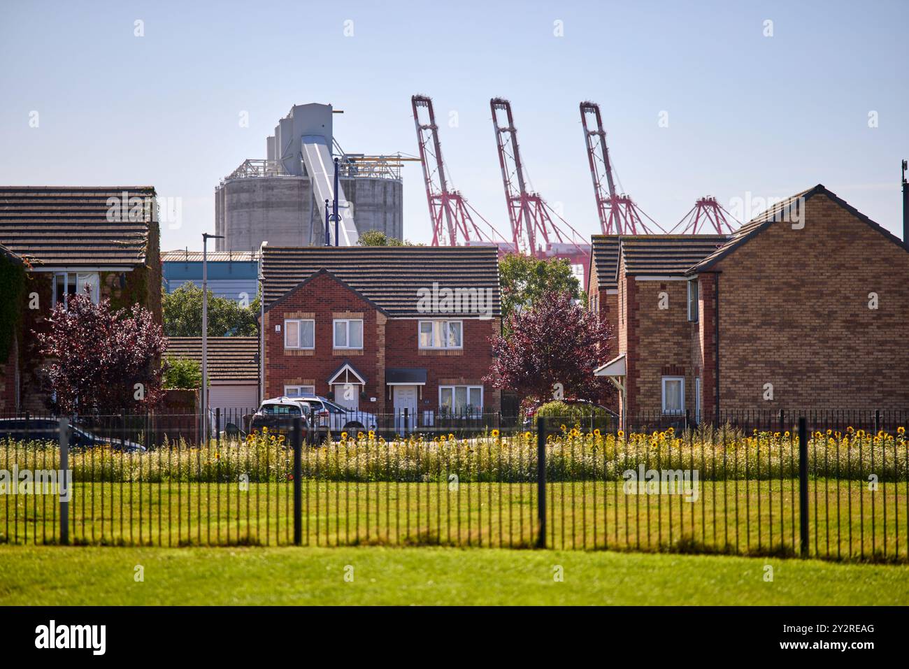 Houses in the Bootle area with the Docks behind Stock Photo - Alamy