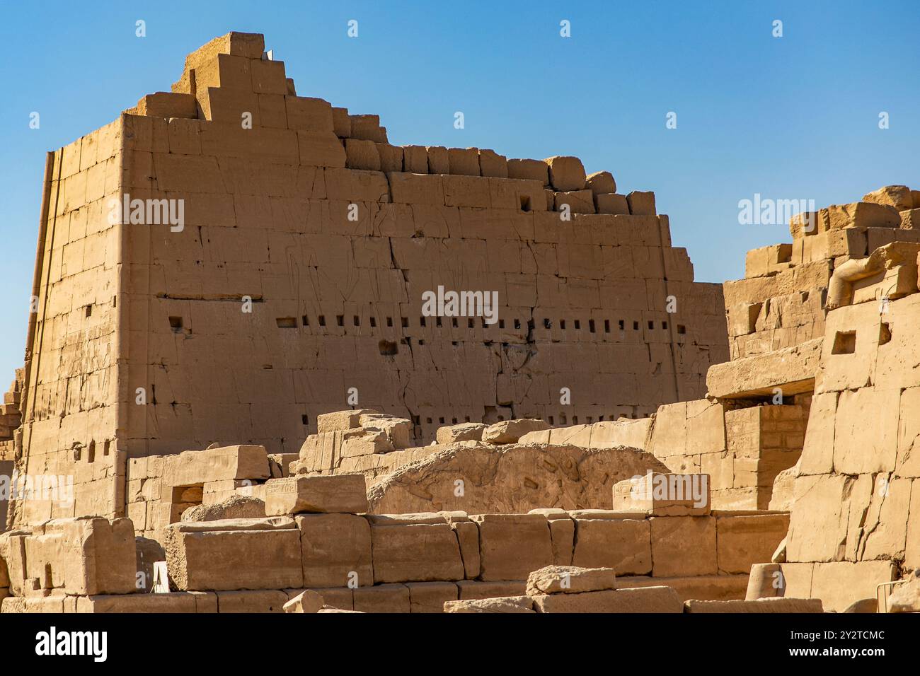 The Temple of Karnak, in the Karnak complex in Luxor, Egypt, is a monument to human ingenuity. The temple was built using massive blocks of stone. Stock Photo