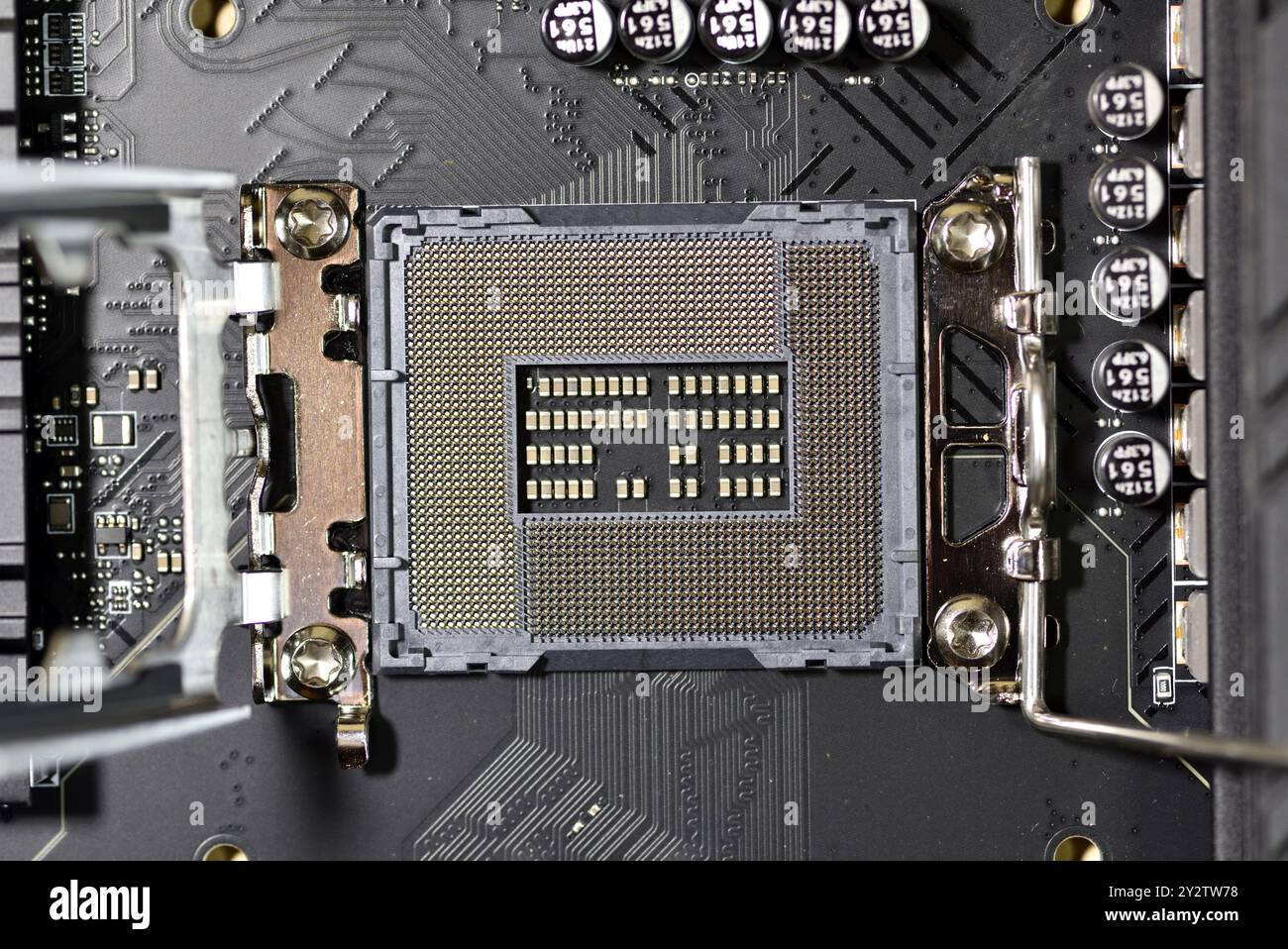 Intel computer CPU socket Alder Lake Socket 1700 with protective cover removed hold down clamp open Stock Photo