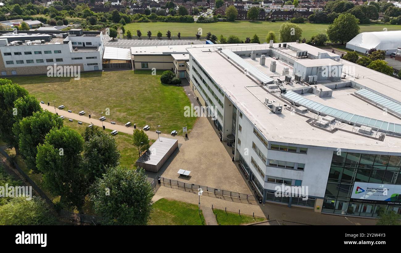 Aerial view of Buckinghamshire College Group campus with green fields ...