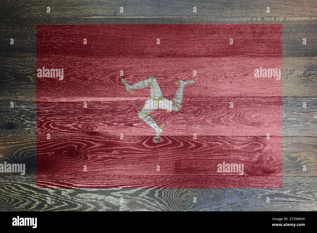 Isle of man flag on rustic old wood surface background Stock Photo - Alamy