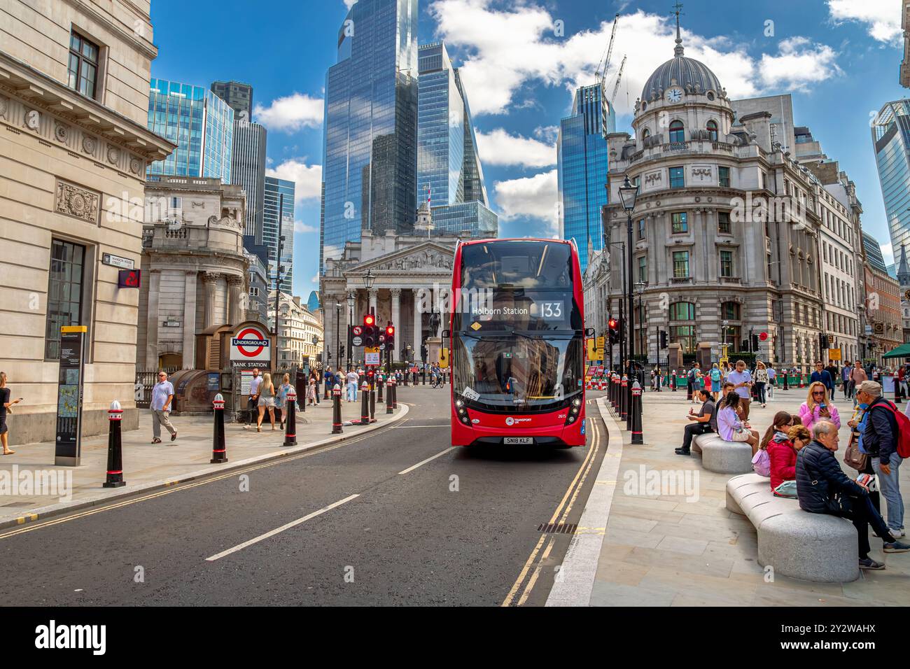 A number 133 London Bus makes it's way through Bank Junction ,City Of London,London, UK Stock Photo