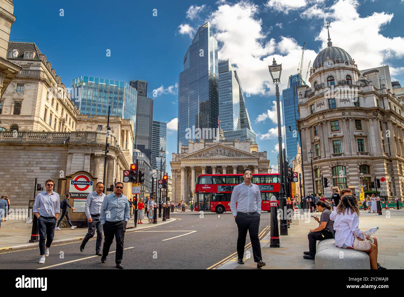 People crossing the road at Bank Junction in The City Of London, London, UK Stock Photo