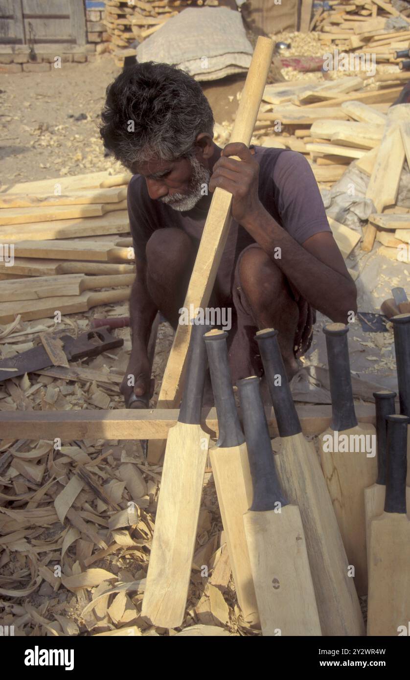 Pada Bat Rajasthan a men is carve Cricket Bats in the Town of Jaisalmer in the Province of ...