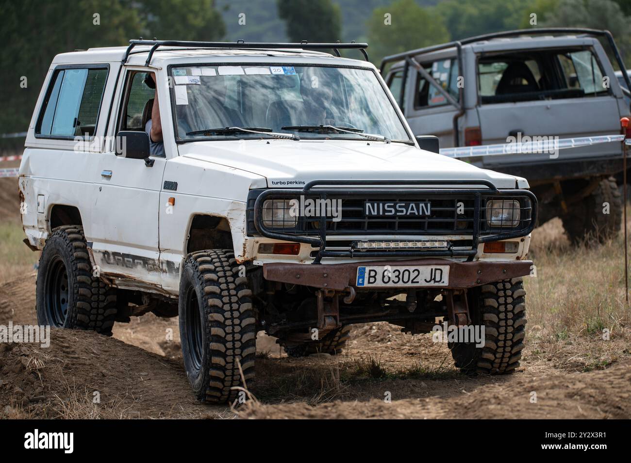 Front view of a classic white third-generation Nissan Patrol