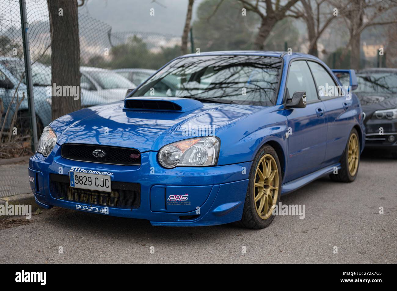 Front view of a nice blue second generation Subaru Impreza STI with ...