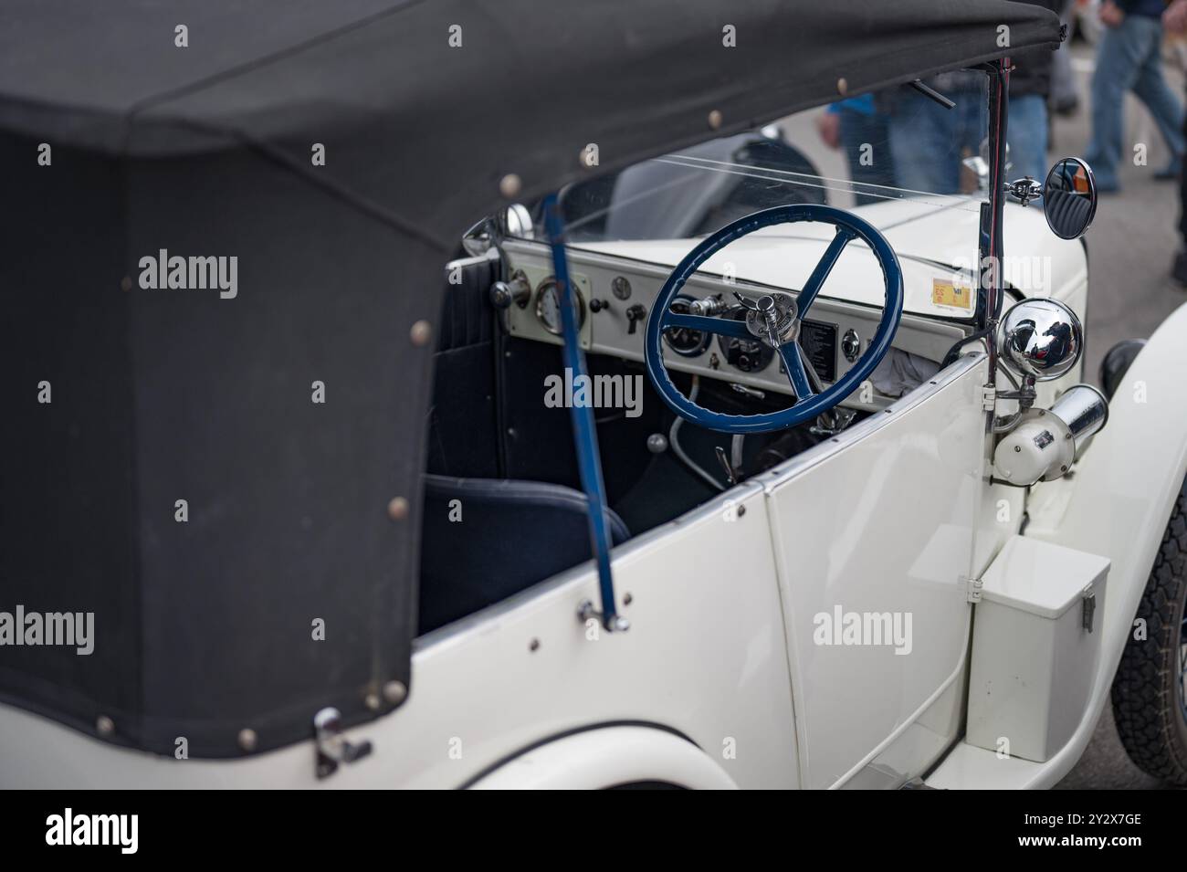 interior of historic white Austin Seven. In the cockpit you can see the ...
