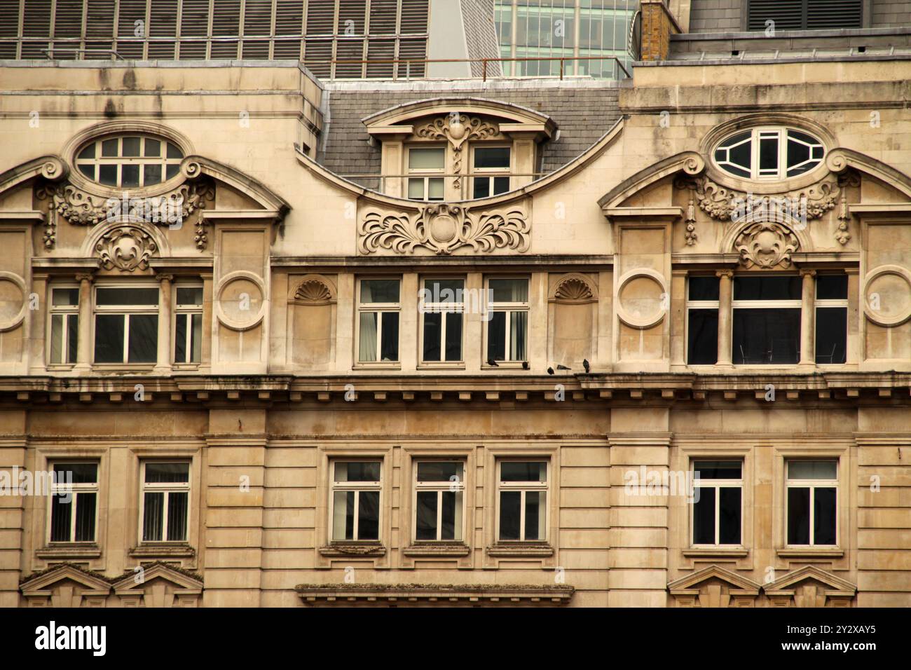 An ornate historical building facade with intricate architectural ...