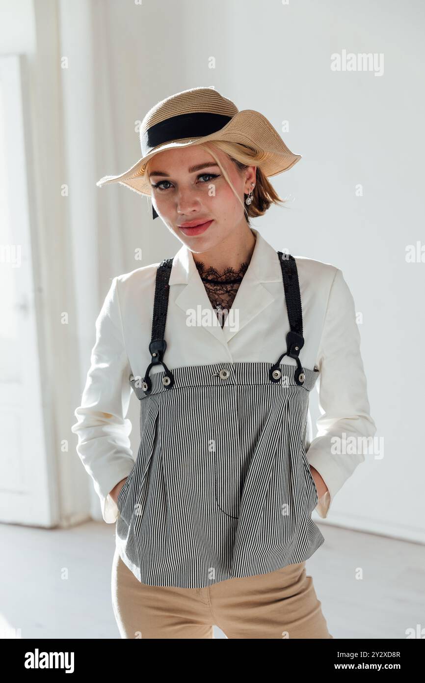 Portrait of a beautiful woman in a hat with a smile Stock Photo - Alamy
