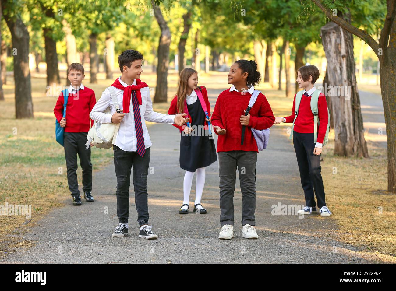 Boy uniform speaking school hi-res stock photography and images - Alamy