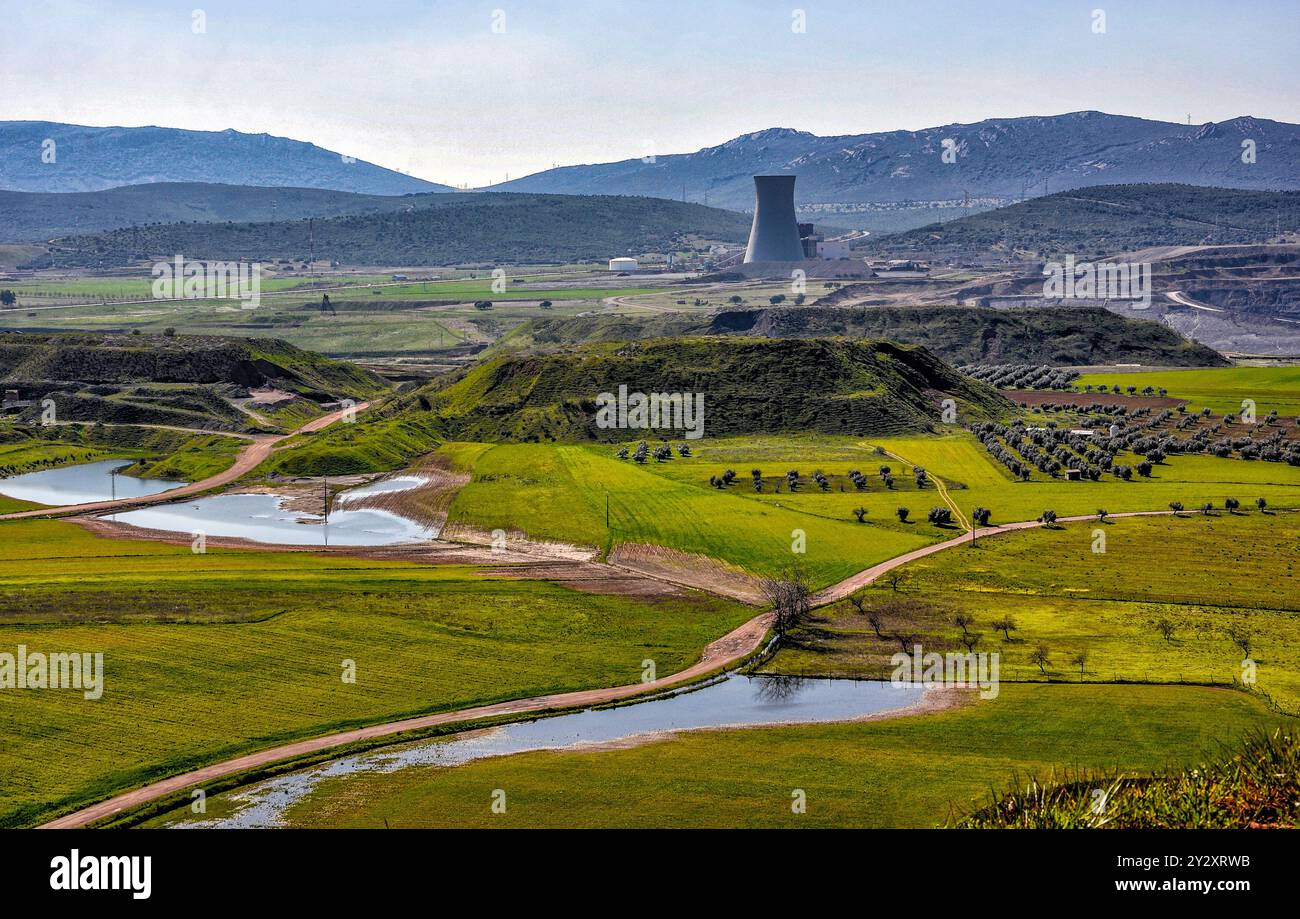 Landscape of the Puertollano coal basin. In the background, the old coal-fired power station that no longer exists Stock Photo