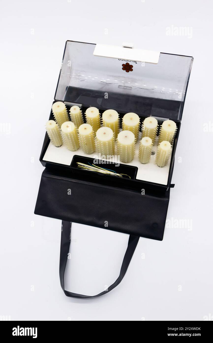 Set of vintage white Carmen plastic heated hair curlers rollers in an ...
