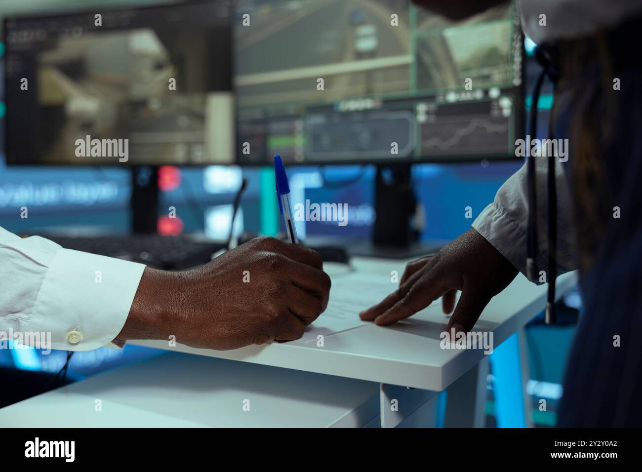 Logistics Contract Signing African american employee signing a new work contract to handle all ...