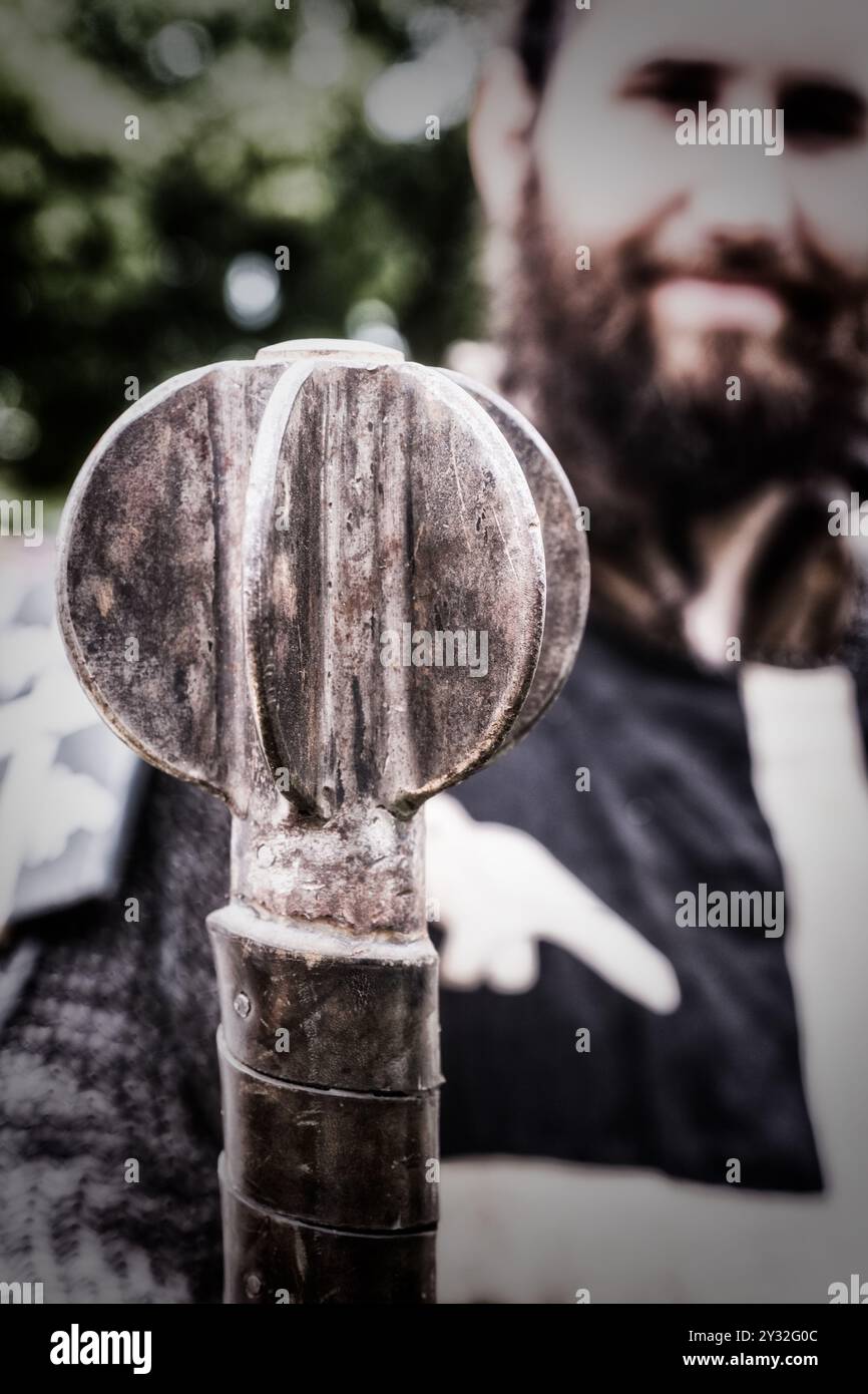 Man holding a mace club at the Battle Of Evesham medieval battle re-enactment. Stock Photo