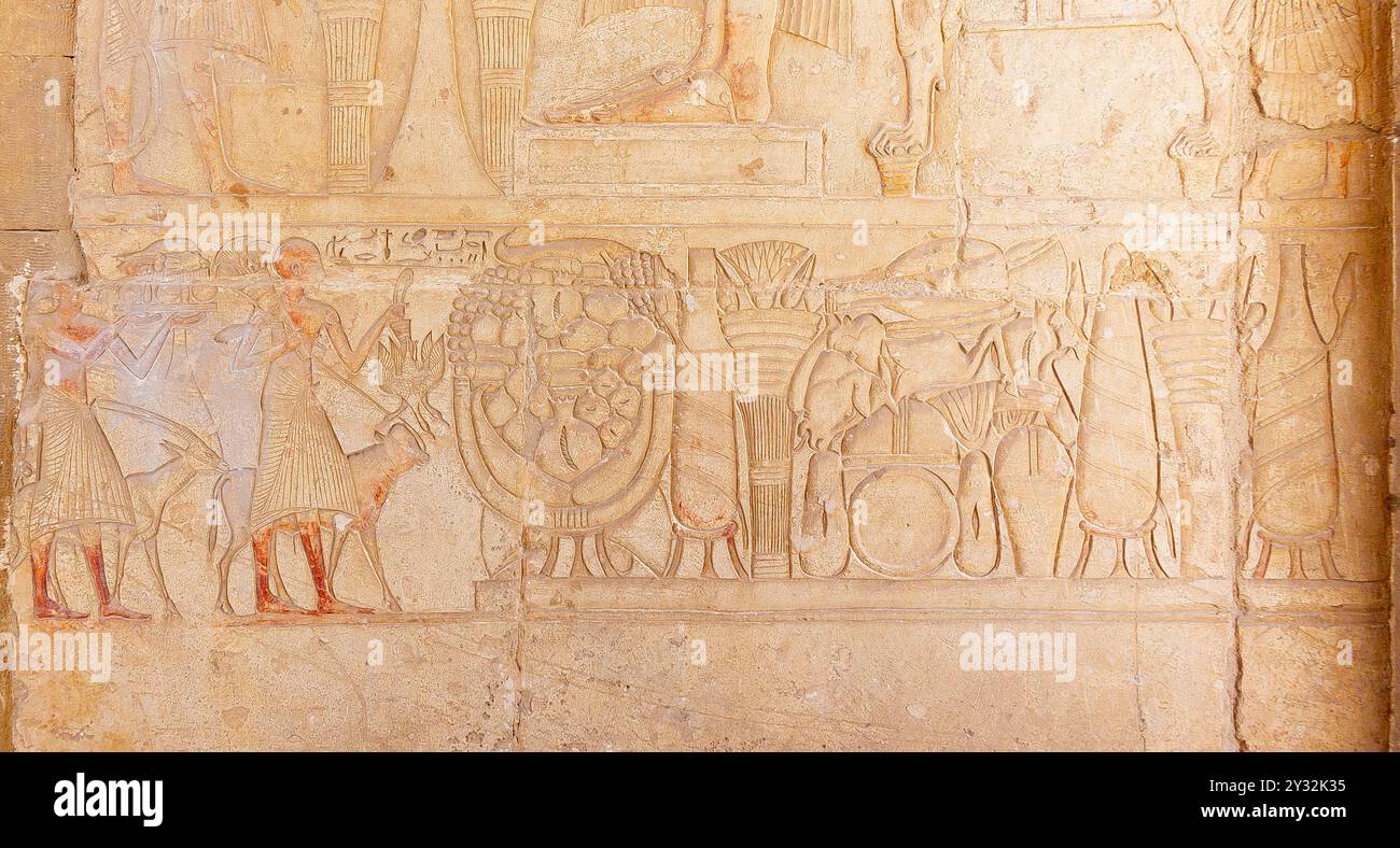 Egypt, Saqqara,  tomb of Horemheb,  statue room, procession of offering bearers. Stock Photo