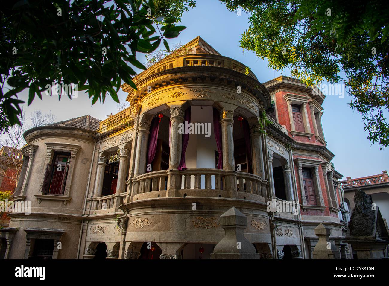 The wooden window of the colonial style house on Gulangyu island, Xiamen, China Stock Photo