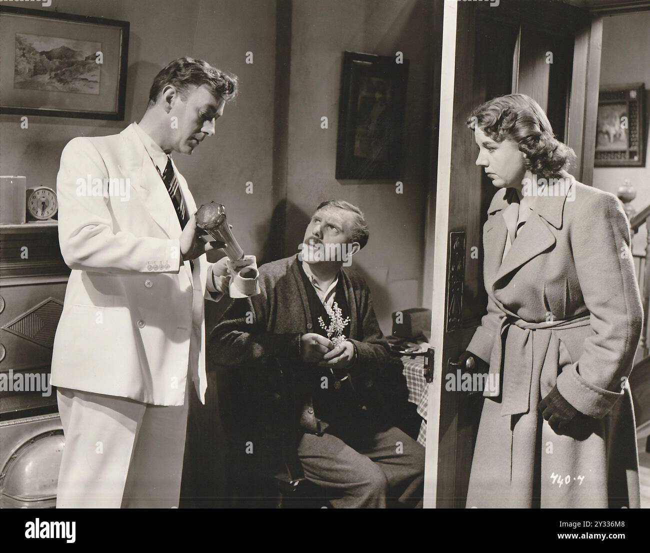 The man in the white suit alec hi-res stock photography and images - Alamy