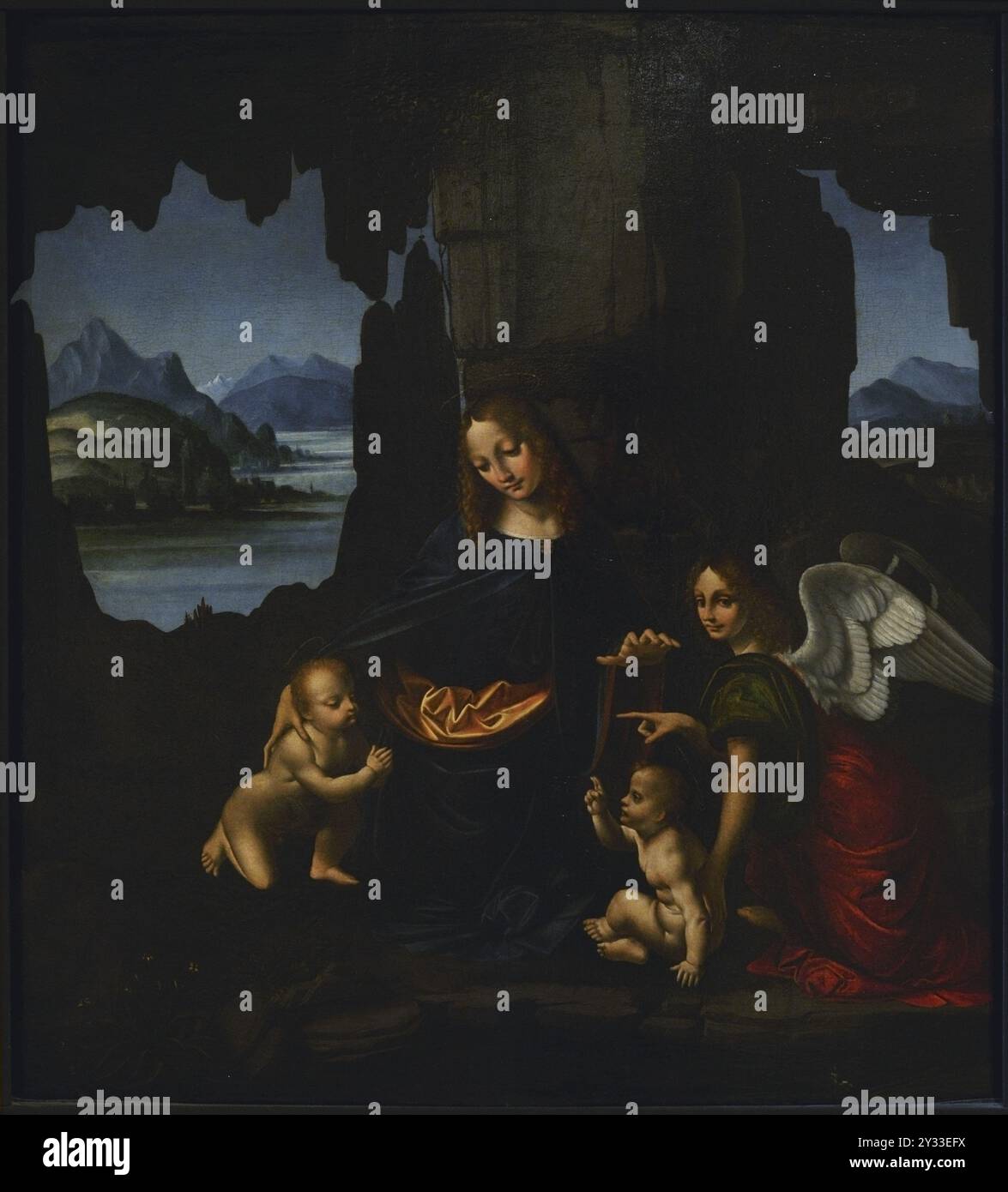 Marco d'Oggiono (ca. 1470-ca. 1549). Italian painter, pupil of Leonardo da Vinci. The Madonna with Child, Saint John and an angel, ca. 1510. Tempera and oil on wooden panel (54 x 48,5 cm). Pinacoteca Castello Sforzesco, Milan, Italy. Stock Photo